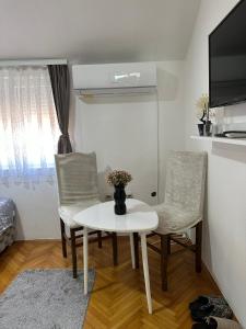 TV a/nebo společenská místnost v ubytování Hostel Gray