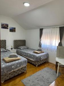 Postel nebo postele na pokoji v ubytování Hostel Gray