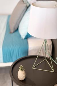 A bed or beds in a room at Oleti Studio Granada