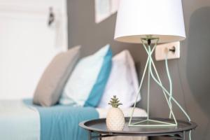 A bed or beds in a room at Oleti Studio Granada