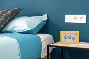 A bed or beds in a room at Oleti Studio Granada