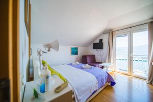 Postel nebo postele na pokoji v ubytování Rooms Denoble