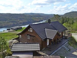 an overhead view of a house with a view of a river at Chalet Fjellkos - SOW146 by Interhome in Fossdal