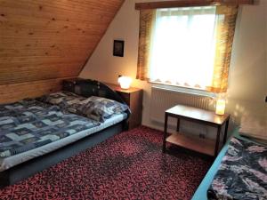 Posteľ alebo postele v izbe v ubytovaní Holiday Home Jahor by Interhome