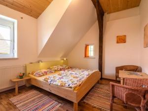 Ένα ή περισσότερα κρεβάτια σε δωμάτιο στο Apartment Landhaus Rosental by Interhome