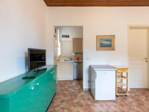 a kitchen with a green counter top in a room at Holiday Home Calderina by Interhome in Imperia