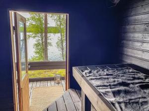 Krevet ili kreveti u jedinici u okviru objekta Holiday Home Saimaanhelmi by Interhome