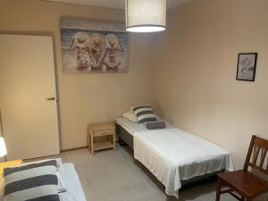 Tempat tidur dalam kamar di Liberty apartment Saarijärvi 17