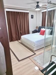 Katil atau katil-katil dalam bilik di Myah's Hotel