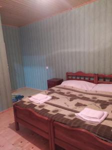 Letto o letti in una camera di Guest House Nene