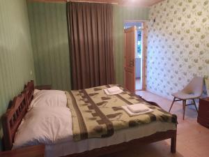 Letto o letti in una camera di Guest House Nene