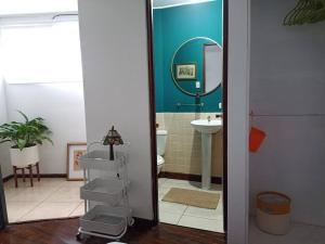 a bathroom with a toilet and a sink at Estudio tipo loft Céntrico y Acogedor in San Pedro