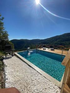 a swimming pool with a view of a mountain at Sapanca Felix Suit Bungalow in Sakarya
