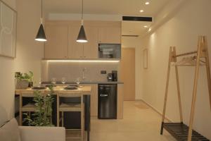 Kuchyň nebo kuchyňský kout v ubytování Living Stone Condo Hotel