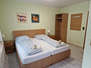 Postel nebo postele na pokoji v ubytování Hotel PB