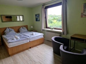 Postel nebo postele na pokoji v ubytování Hotel PB