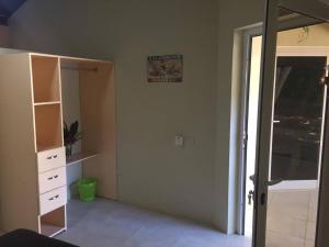 TV a/nebo společenská místnost v ubytování Villa Blind Spot