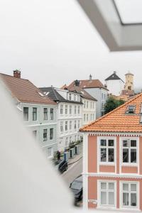 a view from a window of a city with buildings at Centrum Condo with Terrace in Bergen
