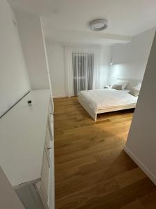 Posteľ alebo postele v izbe v ubytovaní Apartament Revolution