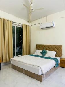 Postel nebo postele na pokoji v ubytování Green Gold Resort