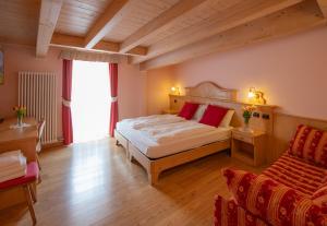 Postel nebo postele na pokoji v ubytování B&B Casa Agostini