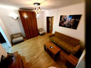 Area soggiorno di Romanian Athenaeum 1BR Apartment with Amazing View