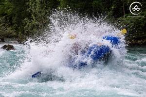 a person in a raft in the water at Rafting Center "TARA-RAFT" in Bastasi