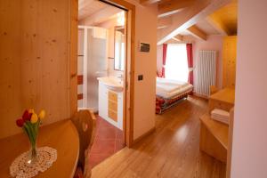 Postel nebo postele na pokoji v ubytování B&B Casa Agostini
