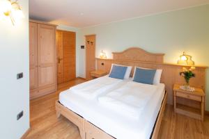 Postel nebo postele na pokoji v ubytování B&B Casa Agostini