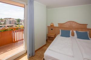 Postel nebo postele na pokoji v ubytování B&B Casa Agostini
