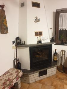 TV a/nebo společenská místnost v ubytování La casa di Giulia