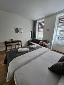 Posteľ alebo postele v izbe v ubytovaní Cozy Core Vienna 10 min to Center