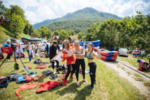 a group of people posing for a picture at a festival at Rafting Center "TARA-RAFT" in Bastasi