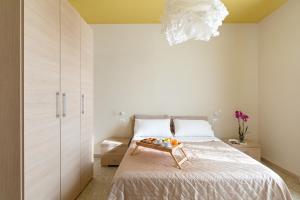 Posteľ alebo postele v izbe v ubytovaní B&B L'Amaca