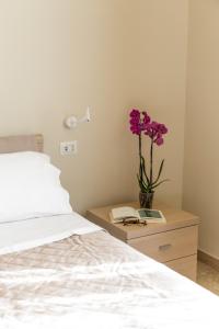 Posteľ alebo postele v izbe v ubytovaní B&B L'Amaca