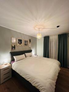 Postel nebo postele na pokoji v ubytování Ferienwohnung Gipfelblick Braunlage mit fantastischem Wurmbergblick