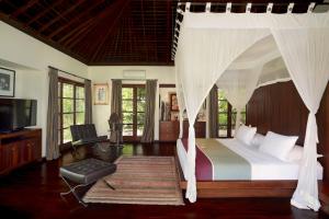 Ένα ή περισσότερα κρεβάτια σε δωμάτιο στο Villa Bali Asri +80 φωτογραφίες