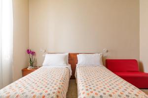 Posteľ alebo postele v izbe v ubytovaní B&B L'Amaca