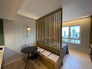Ένα ή περισσότερα κρεβάτια σε δωμάτιο στο Suíte Luxuosa com cozinha Blend Smart 1356 +34 φωτογραφίες