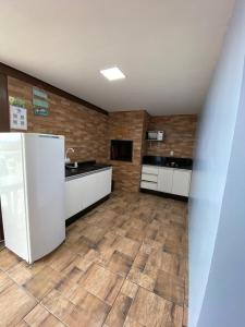 A cozinha ou cozinha compacta de Residencial Gralha Azul