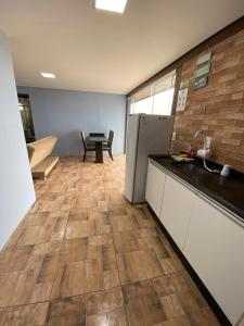 A cozinha ou cozinha compacta de Residencial Gralha Azul