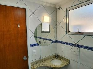 Phòng tắm tại Flats Enseada Delphin