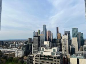 a view of a large city with skyscrapers at Quiet CBD 3b2b apartment + free parking in Melbourne