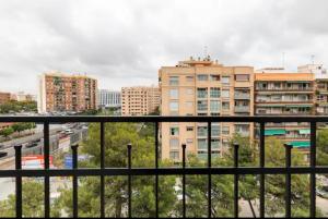 a view of a city from a balcony with buildings at private room in shared apartment Valencia WorkStay in Valencia