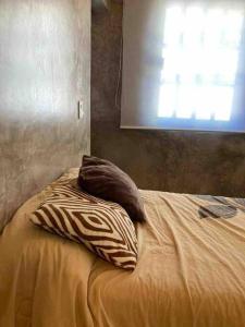 Een bed of bedden in een kamer bij Casita Guayaba
