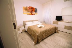 Tempat tidur dalam kamar di B&B La Zia - Manoppello
