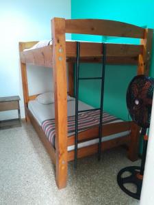 Postel nebo postele na pokoji v ubytování Gaudy's Hotel