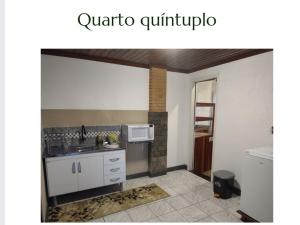 Η κουζίνα ή μικρή κουζίνα στο Flats Brancas Nuvens +18 φωτογραφίες