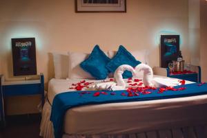 Łóżko lub łóżka w pokoju w obiekcie Hotel Crillon