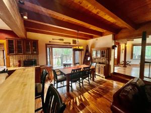 a kitchen and dining room with a table and chairs at Family Haven in Graeagle CA w/King Bed Suite in Graeagle